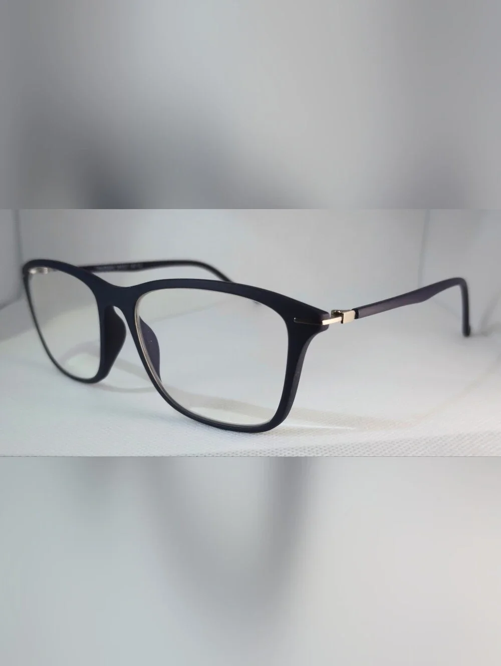 Thursday. Dark Navy Rectangular Eyeglass Frames. Rounded Edges